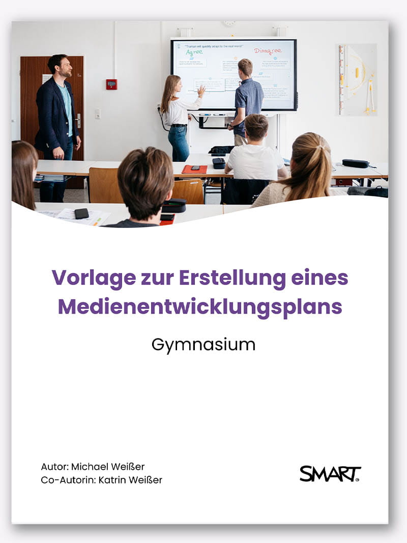 Students and teacher engaged with a SMART board during class.