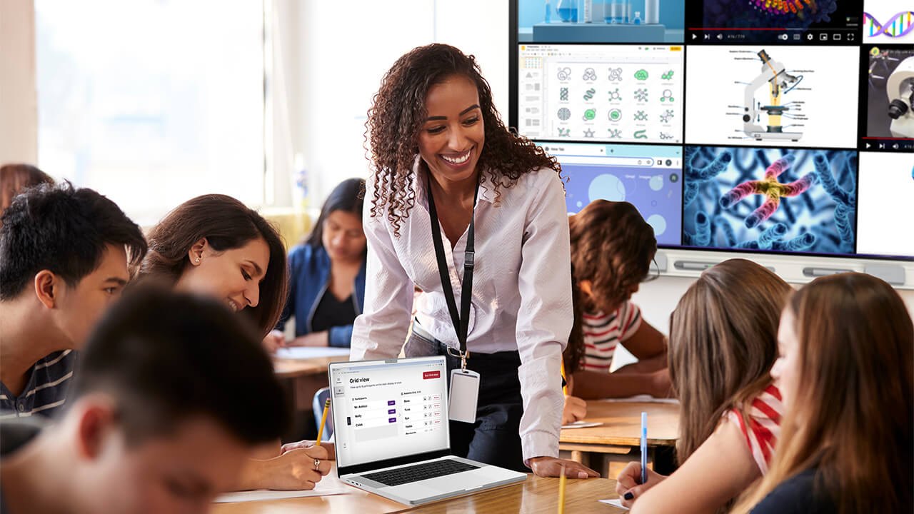 Teacher roaming a classroom with SMART Mirror on the SMART Board